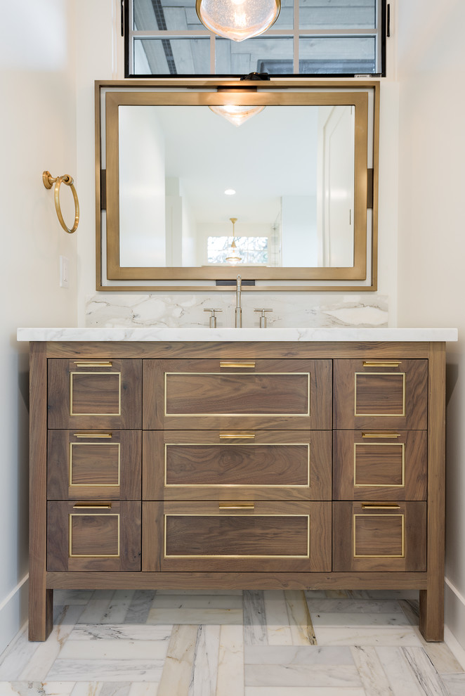 Inspiration for a transitional bathroom in Salt Lake City with shaker cabinets, medium wood cabinets, marble and marble benchtops.