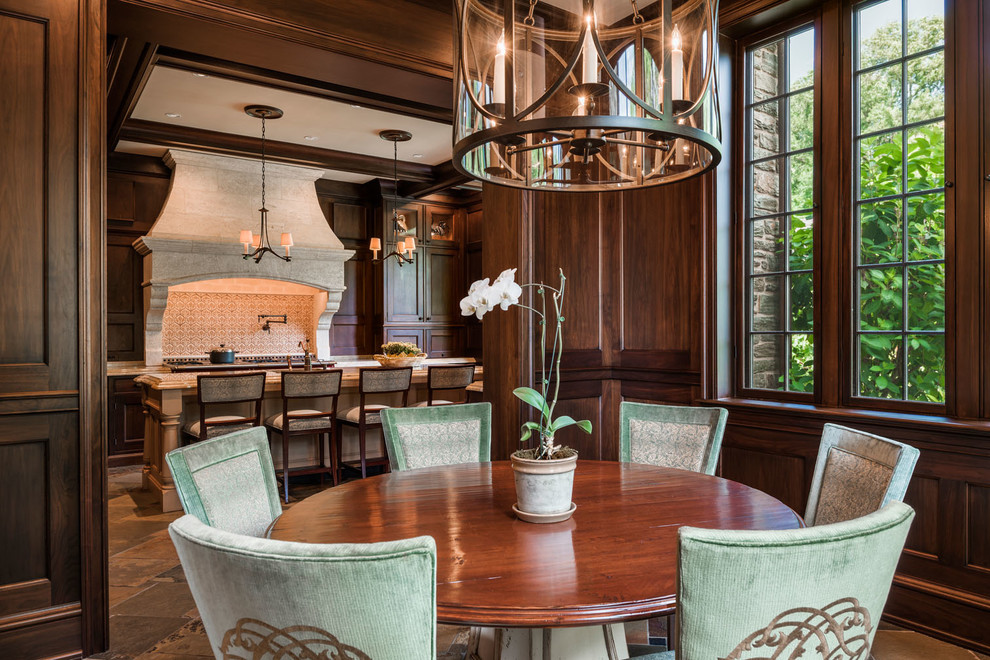 This is an example of a traditional dining room in Philadelphia with brown walls.