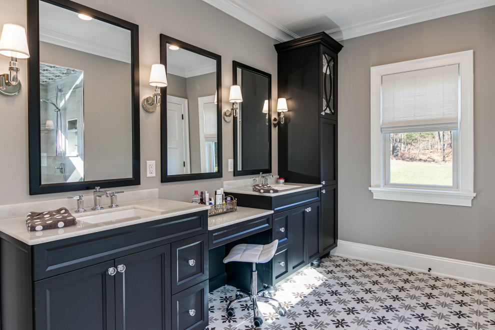 Inspiration for a traditional master bathroom in Other with recessed-panel cabinets, black cabinets, an alcove shower, beige walls, an undermount sink, multi-coloured floor and beige benchtops.