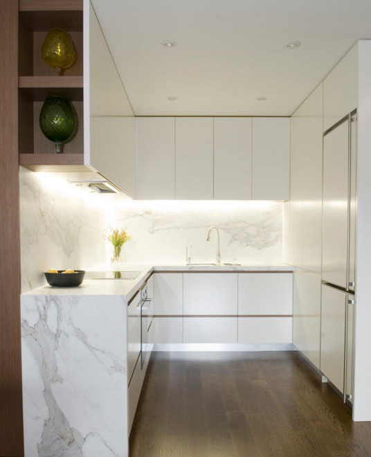 Inspiration for a small contemporary u-shaped separate kitchen in Other with a double-bowl sink, louvered cabinets, white cabinets, wood benchtops, white splashback and black appliances.