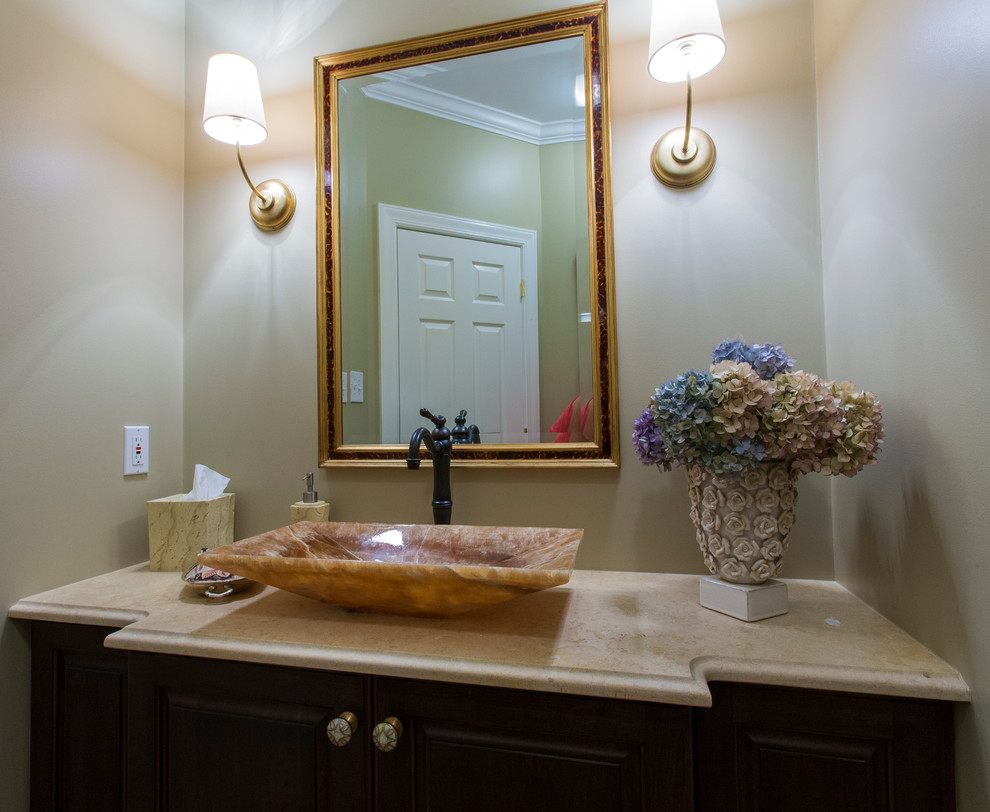 Inspiration for a small transitional dark wood floor bathroom remodel in DC Metro with a vessel sink, furniture-like cabinets, dark wood cabinets, quartzite countertops, a two-piece toilet and pink walls
