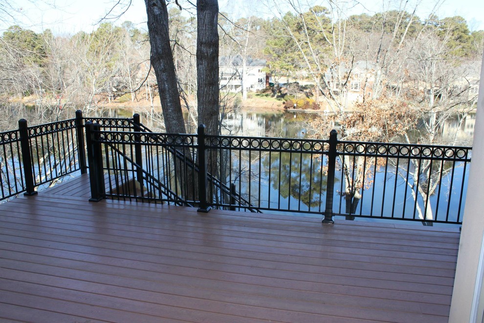 Example of a large rooftop balcony deck design in Atlanta with no cover