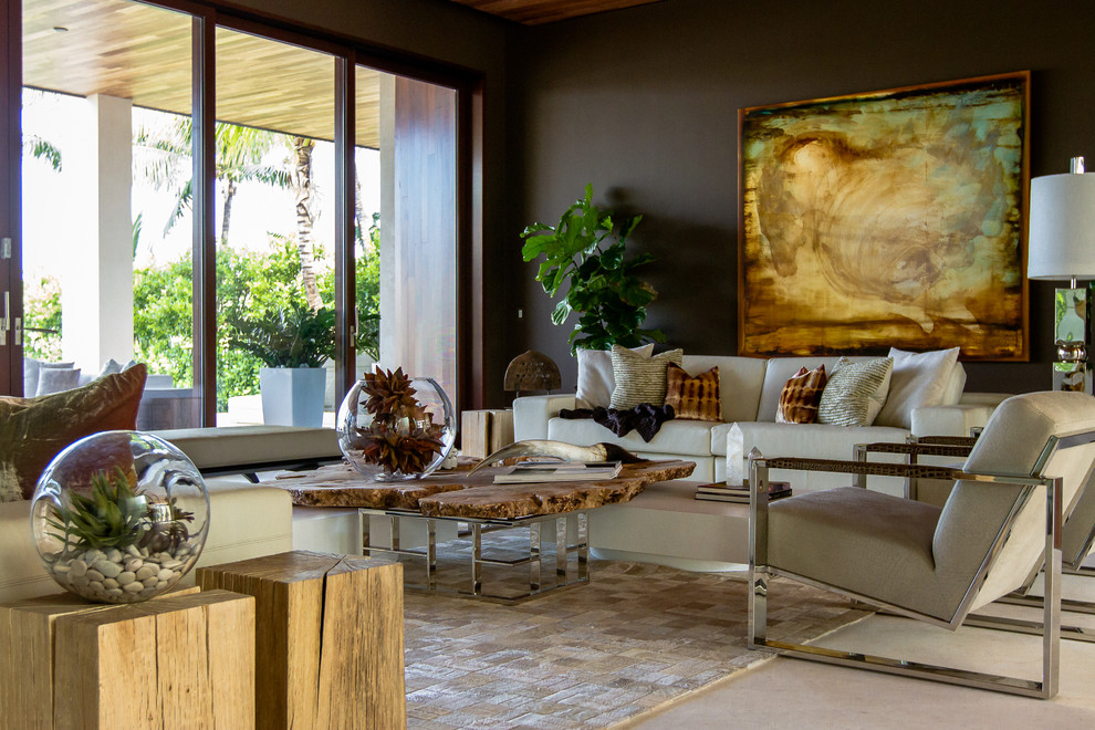 Photo of a large contemporary formal living room in Miami with brown walls and beige floor.