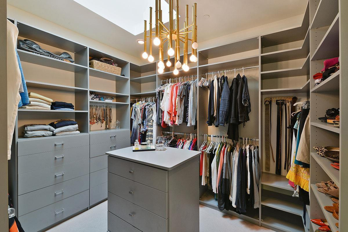 Remi Thomas #3 remodel of walk-in closet, added skylight and center island