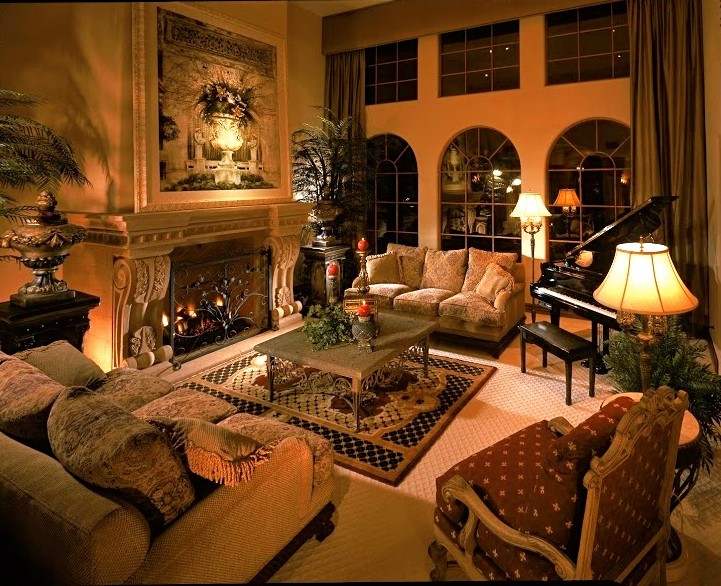 Photo of an expansive mediterranean formal loft-style living room in Phoenix with beige walls, a standard fireplace, carpet and a stone fireplace surround.