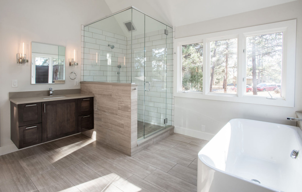 This is an example of a mid-sized contemporary master bathroom in Other with shaker cabinets, dark wood cabinets, a drop-in tub, a shower/bathtub combo, white tile, mosaic tile, white walls, medium hardwood floors, an undermount sink and a single vanity.