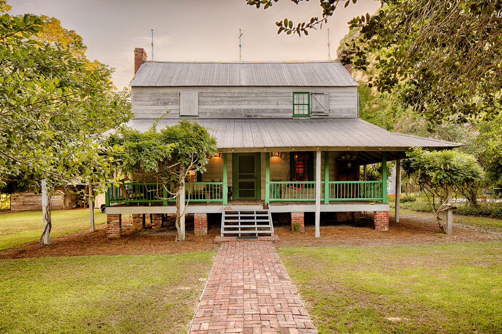 Country one-story wood exterior home photo in Charleston