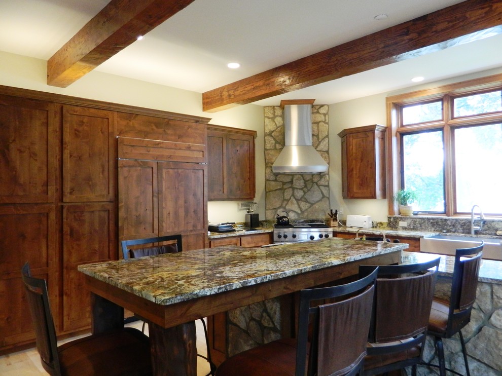 Design ideas for a country eat-in kitchen in Other with dark wood cabinets, granite benchtops and stainless steel appliances.