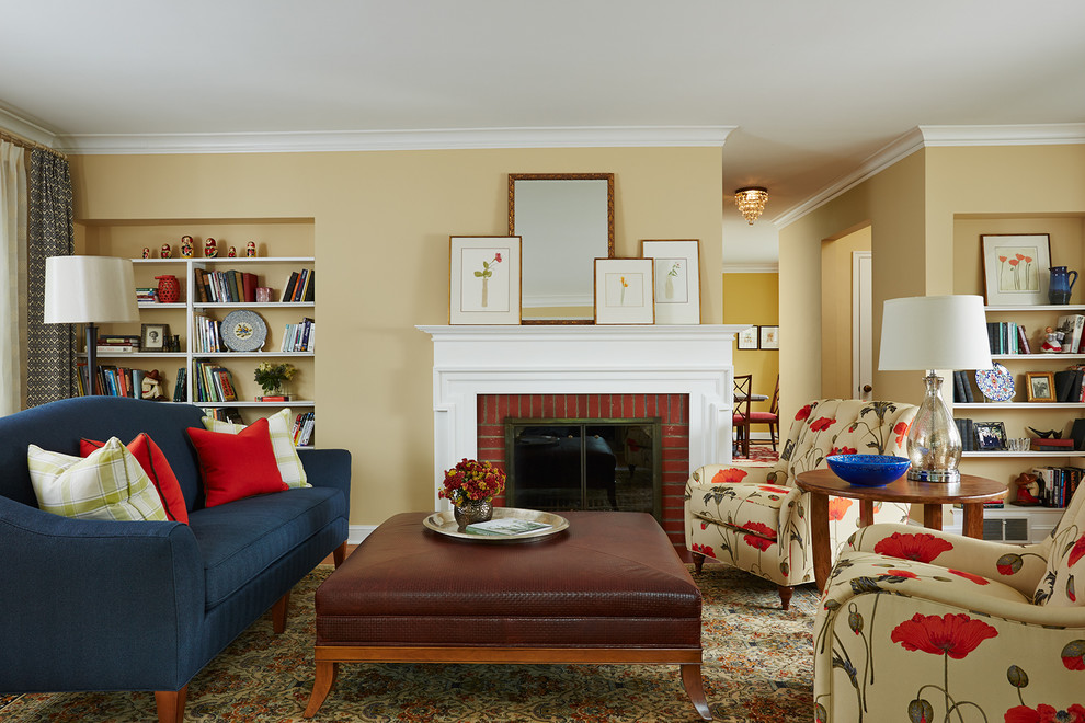 Example of a mid-sized classic enclosed medium tone wood floor living room design in Minneapolis with beige walls, a standard fireplace and a brick fireplace