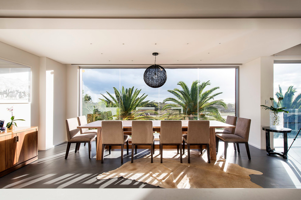 Large contemporary kitchen/dining combo in Perth with white walls and ceramic floors.