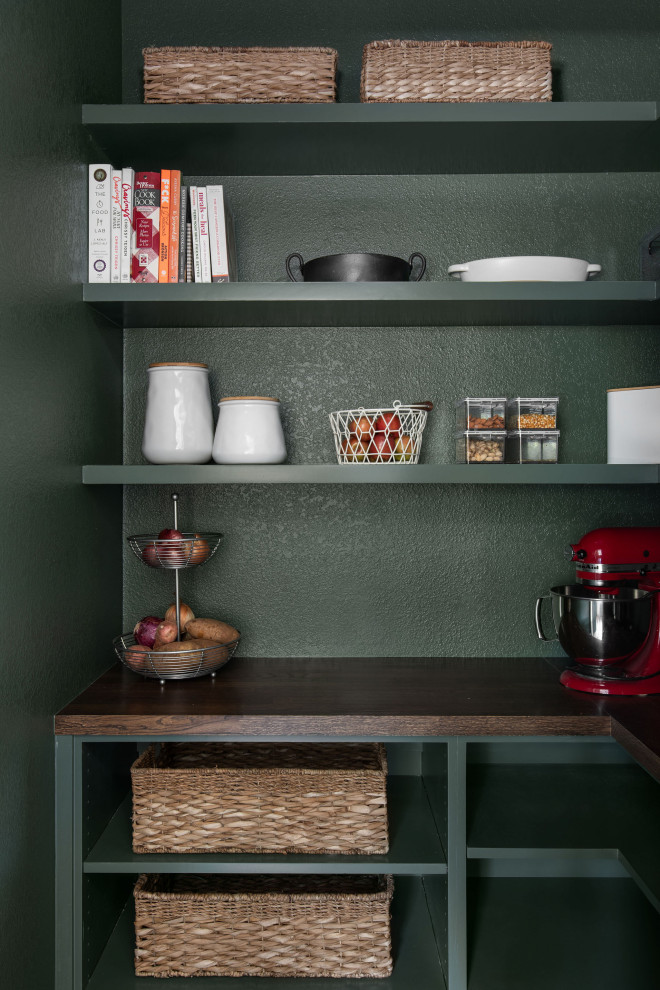 Inspiration for a large transitional u-shaped dark wood floor and brown floor open concept kitchen remodel in Austin with an undermount sink, shaker cabinets, green cabinets, quartz countertops, white backsplash, porcelain backsplash, stainless steel appliances, a peninsula and white countertops