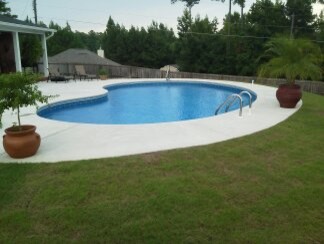 Mid-sized backyard kidney-shaped indoor pool photo