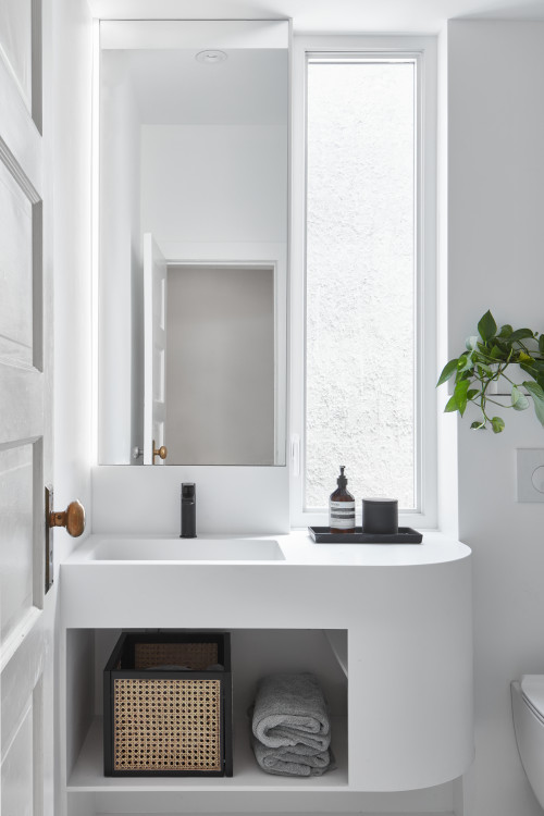 Understated Beauty: An All-White Affair with Gray Accents for Scandinavian Bathroom Ideas