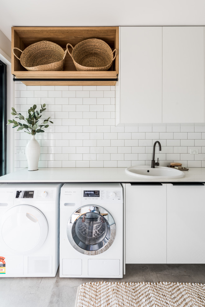 This is an example of a contemporary laundry room in Gold Coast - Tweed.