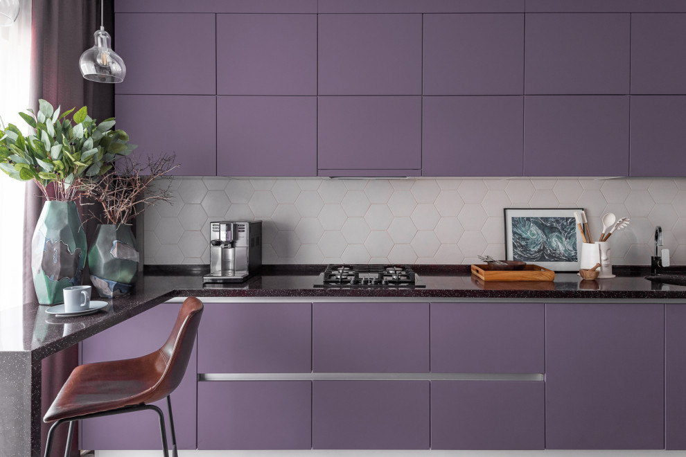 Inspiration for a mid-sized contemporary l-shaped eat-in kitchen in Other with an undermount sink, flat-panel cabinets, purple cabinets, terrazzo benchtops, grey splashback, ceramic splashback, black appliances, vinyl floors, no island, brown floor and black benchtop.