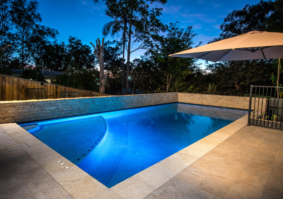 Design ideas for a traditional pool in Brisbane.