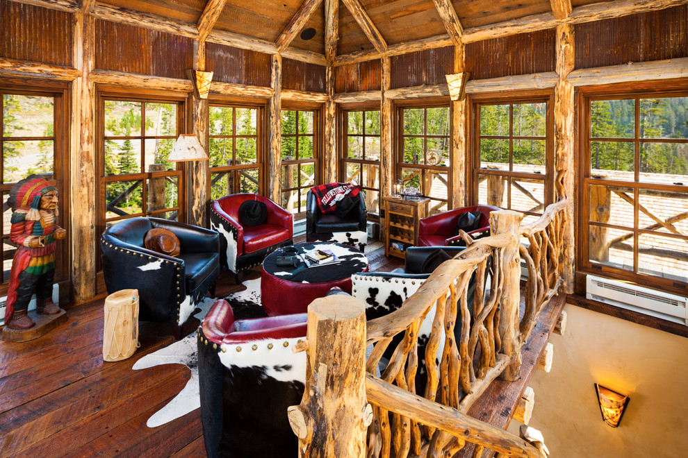 Inspiration for a mid-sized rustic dark wood floor sunroom remodel with a standard ceiling