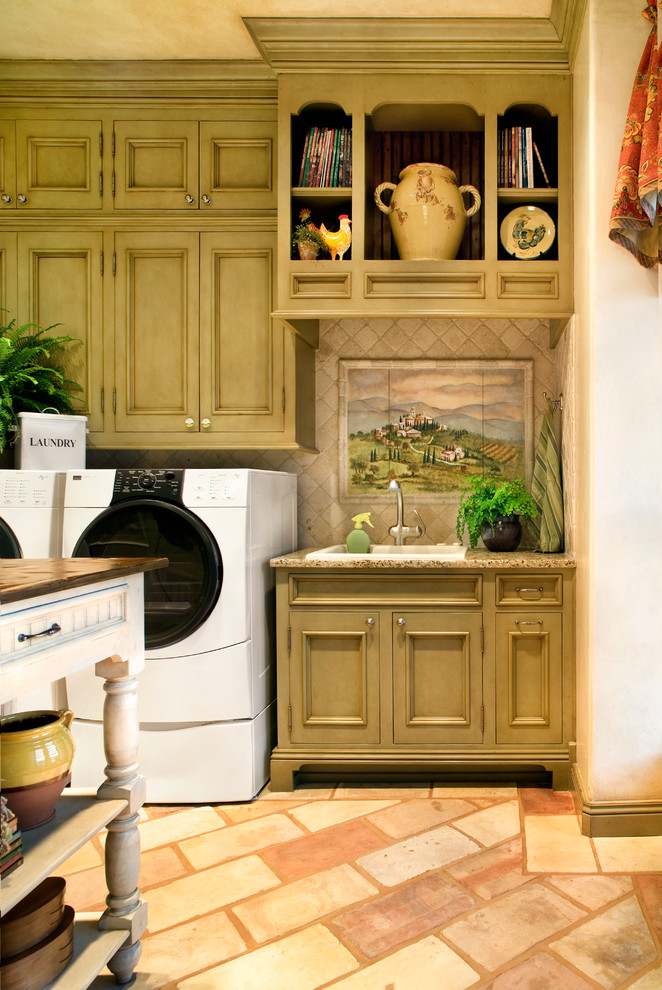 This is an example of a mediterranean laundry room in Austin.