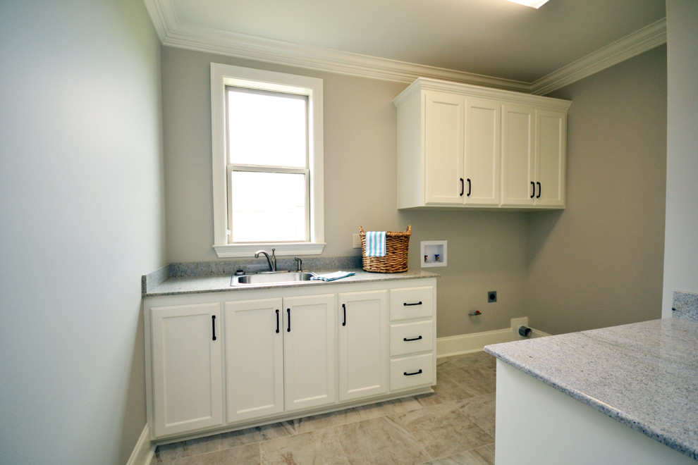 This is an example of a transitional laundry room in New Orleans.