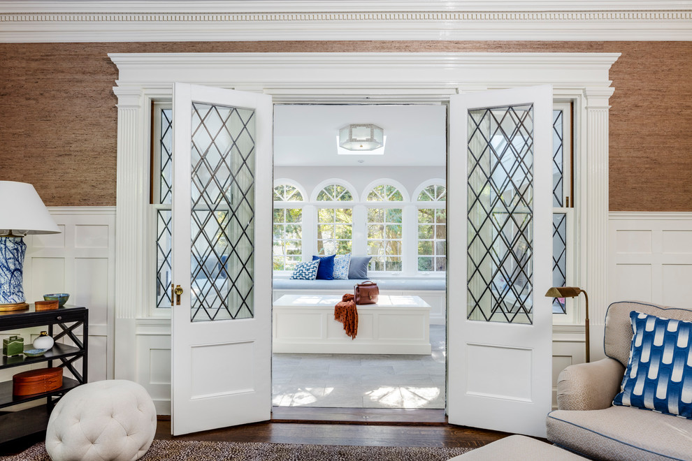 Inspiration for a large transitional ceramic tile mudroom remodel in Boston with gray walls and a blue front door