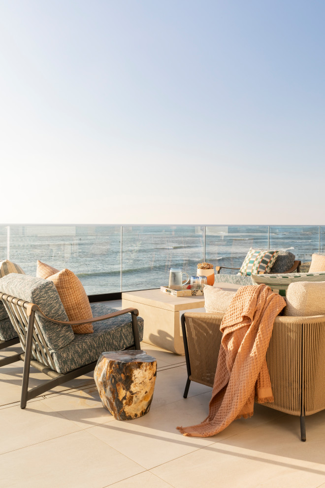 Deck - transitional backyard second story glass railing deck idea in San Diego