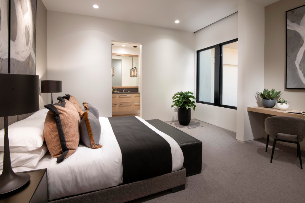 Стильный дизайн: большая гостевая спальня (комната для гостей) в стиле модернизм с белыми стенами и ковровым покрытием - последний тренд