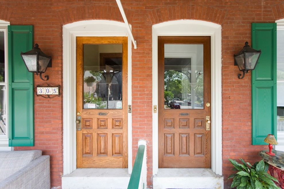 Mid-sized traditional front door in Philadelphia with a single front door and a medium wood front door.