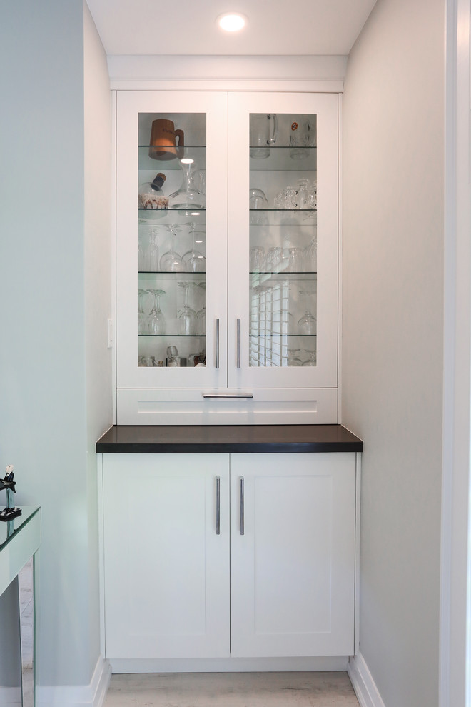 Example of a transitional home design design in Toronto