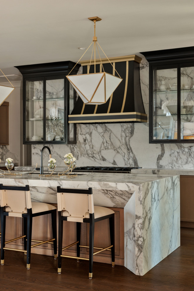 Inspiration for a transitional kitchen remodel in Austin with marble countertops and marble backsplash