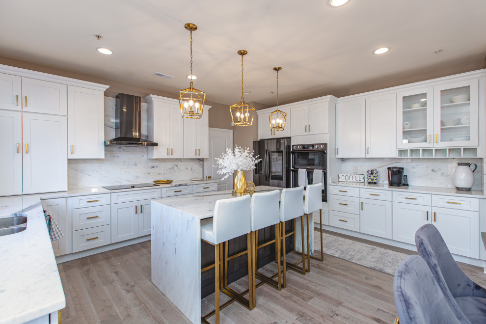 Eat-in kitchen - large coastal single-wall bamboo floor and gray floor eat-in kitchen idea in DC Metro with a double-bowl sink, shaker cabinets, white cabinets, granite countertops, white backsplash, slate backsplash, black appliances, an island and white countertops