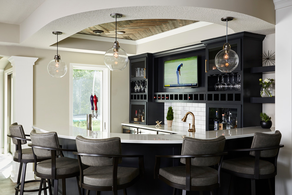 Inspiration for a large country home bar in Minneapolis with white benchtop.