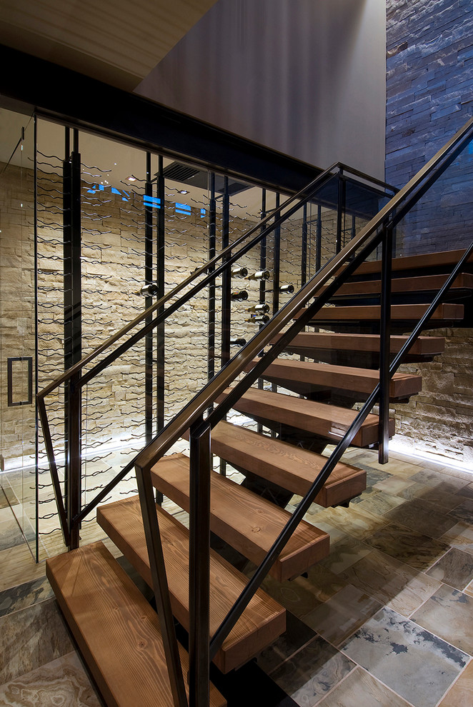 Photo of a large contemporary staircase in Denver.