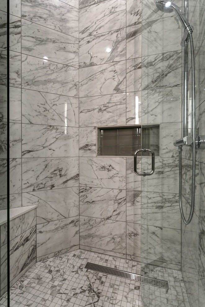 Inspiration for a mid-sized contemporary master bathroom in Seattle with shaker cabinets, dark wood cabinets, a drop-in tub, a corner shower, gray tile, white tile, marble, brown walls, marble floors, a drop-in sink, engineered quartz benchtops, multi-coloured floor and a hinged shower door.