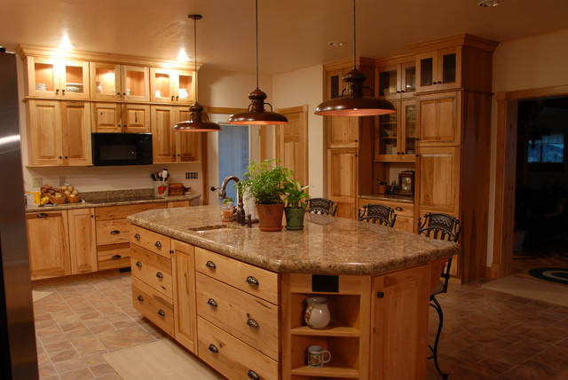 Rustic look with Hickory cabinets from KraftMaid - Rustic - New York