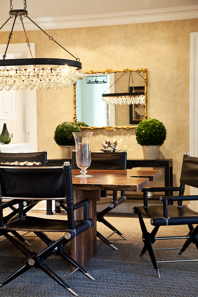 Inspiration for a mid-sized transitional separate dining room in New York with beige walls and dark hardwood floors.
