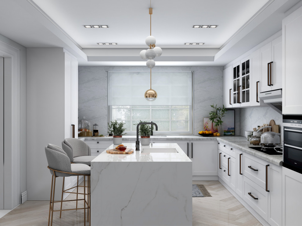 Mid-sized midcentury u-shaped separate kitchen in New York with an undermount sink, beaded inset cabinets, white cabinets, marble benchtops, white splashback, marble splashback, black appliances, light hardwood floors, with island, beige floor, grey benchtop and recessed.