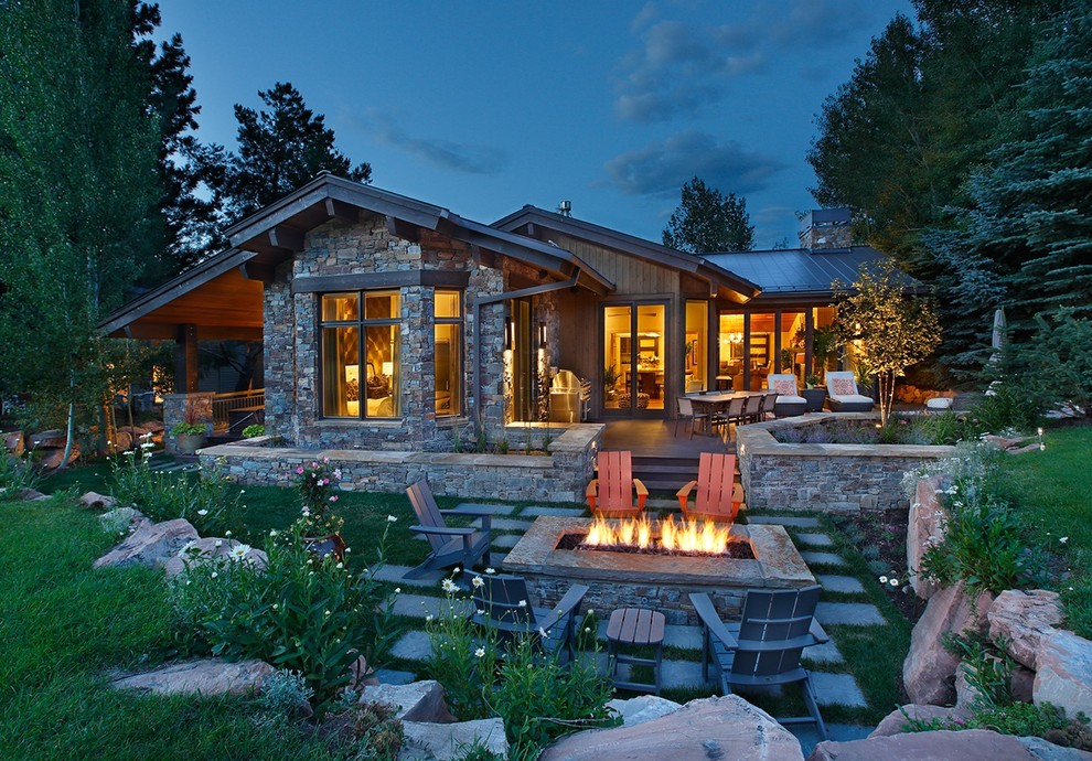 Design ideas for a large arts and crafts backyard patio in Salt Lake City with a fire feature, natural stone pavers and no cover.