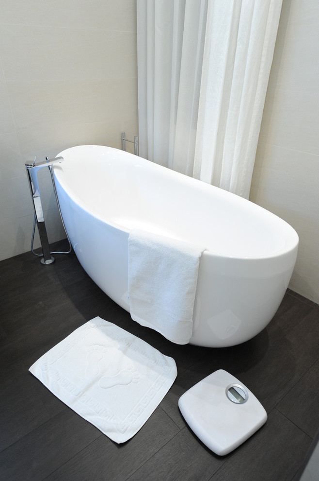 Example of a trendy freestanding bathtub design in Other
