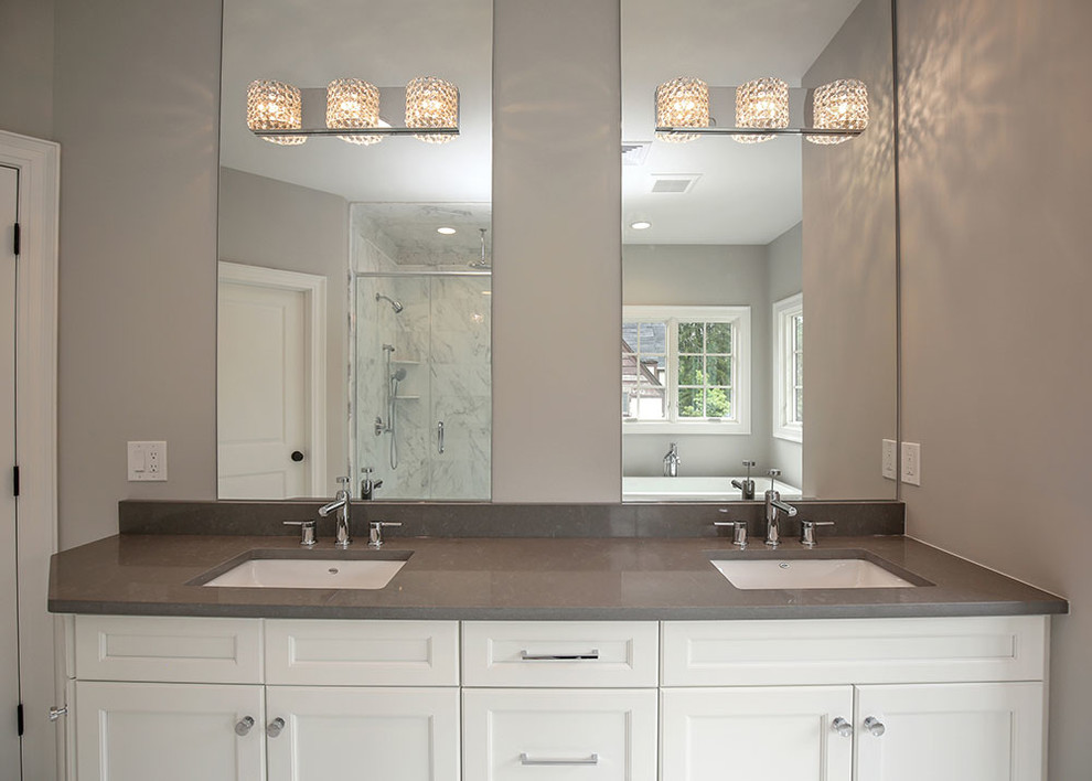 Design ideas for a large transitional master bathroom in New York with white cabinets, multi-coloured tile, ceramic tile, grey walls, marble floors, an undermount sink, engineered quartz benchtops, a freestanding tub, a double shower and recessed-panel cabinets.