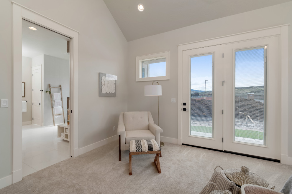Mid-sized country master bedroom in Boise with grey walls, carpet, no fireplace and grey floor.