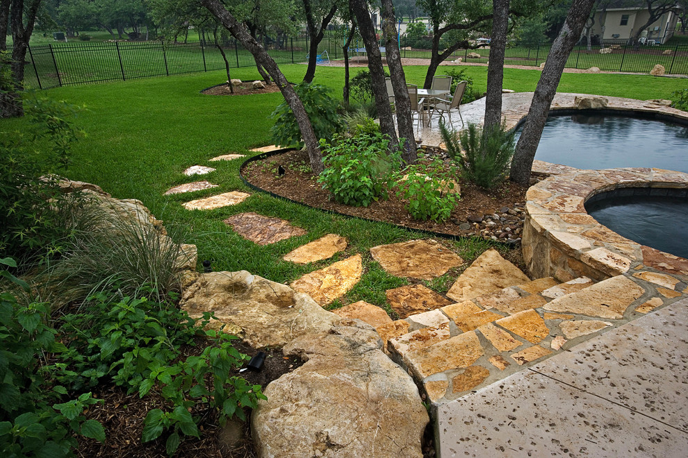 Photo of a mid-sized rustic landscaping.