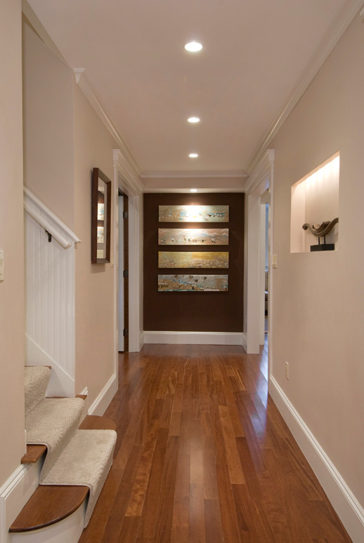 Photo of a large traditional hallway in Boston with beige walls.