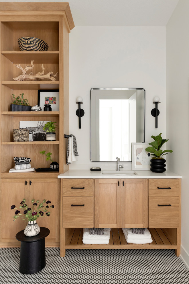 Large beach style shower room bathroom in Minneapolis with flat-panel cabinets, light wood cabinets, grey walls, ceramic flooring, a submerged sink, engineered stone worktops, multi-coloured floors, white worktops, a single sink and a built in vanity unit.