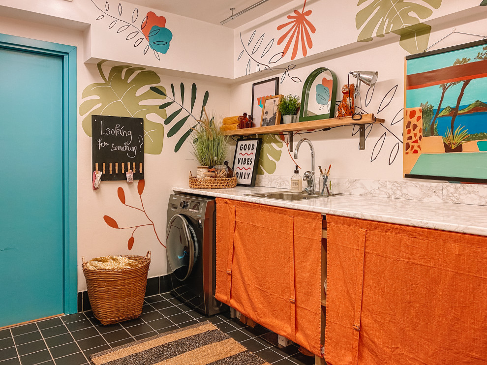 Inspiration for an eclectic laundry room remodel in Stockholm
