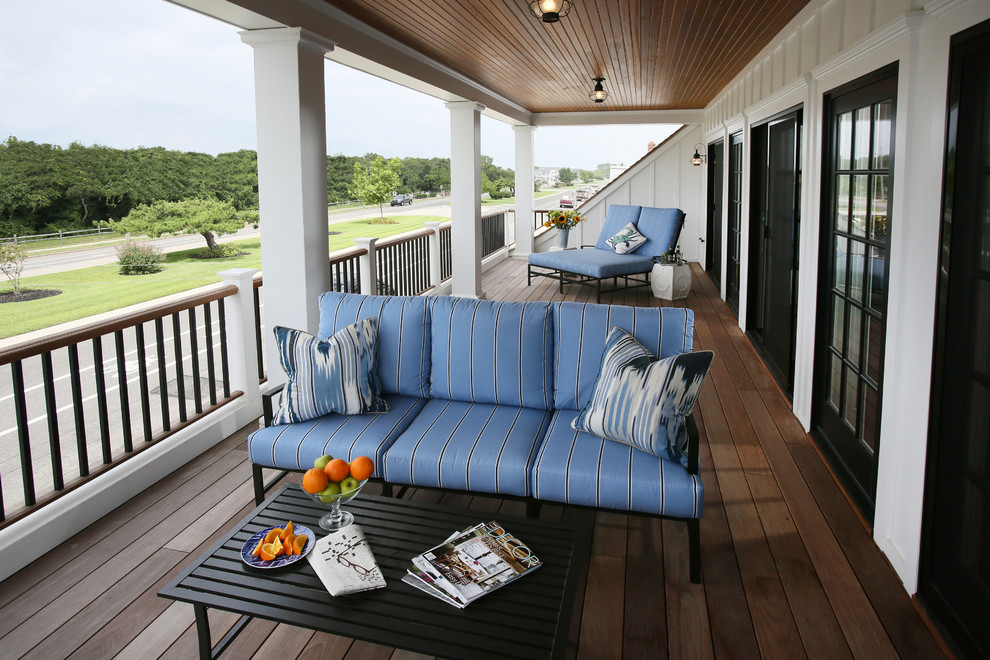 Inspiration for a mid-sized coastal balcony remodel in Philadelphia with a roof extension