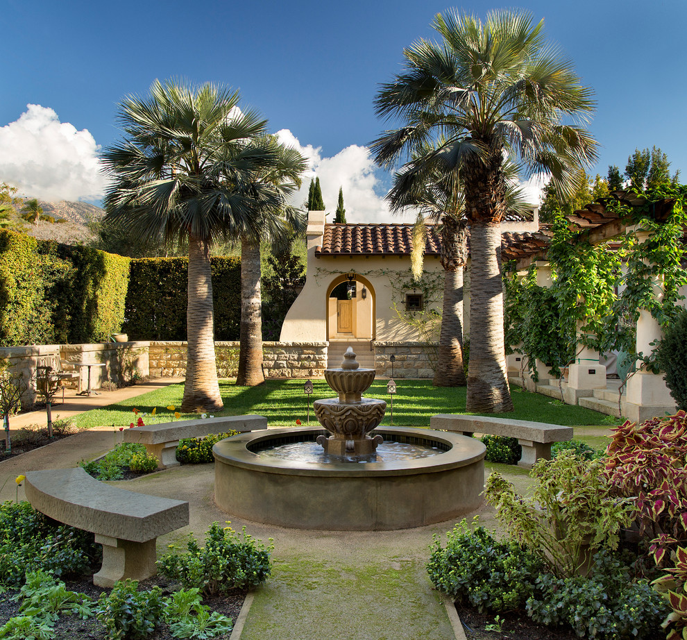 Mediterranean partial sun formal garden in Santa Barbara.