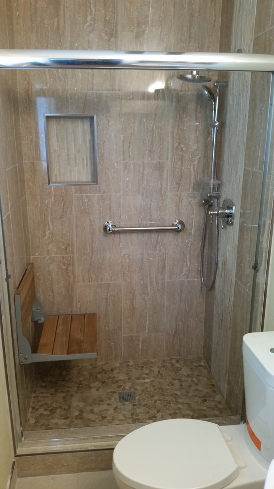 Photo of a small traditional master bathroom in San Diego with a pedestal sink, an alcove shower, a one-piece toilet, brown tile, ceramic tile, beige walls and ceramic floors.