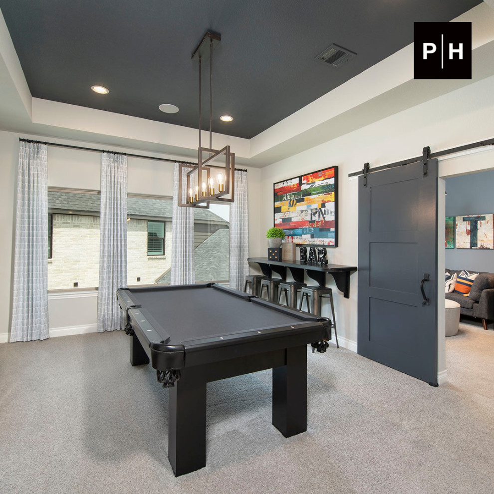Inspiration for an enclosed games room in Houston with a game room, beige walls, carpet and a drop ceiling.