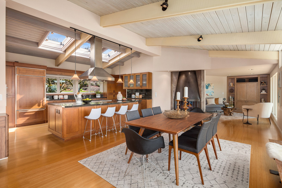 This is an example of a midcentury dining room in Seattle.