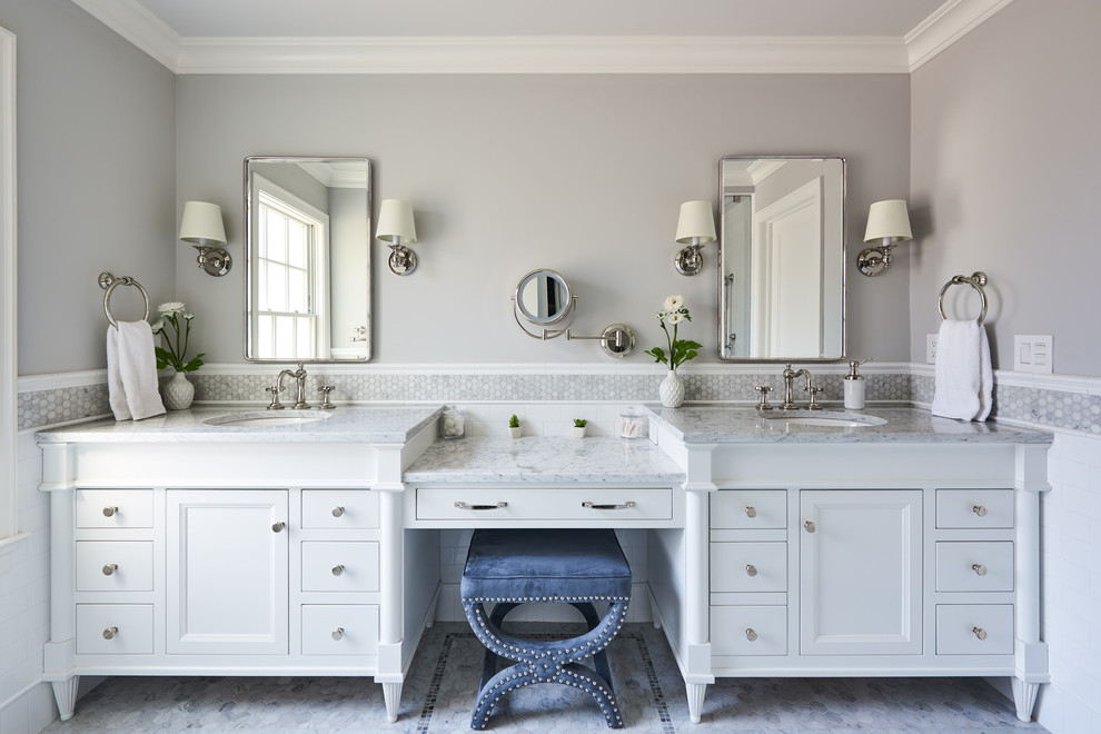 Transitional bathroom in New York with white cabinets, white tile, subway tile, grey walls, an undermount sink, grey floor, grey benchtops and recessed-panel cabinets.